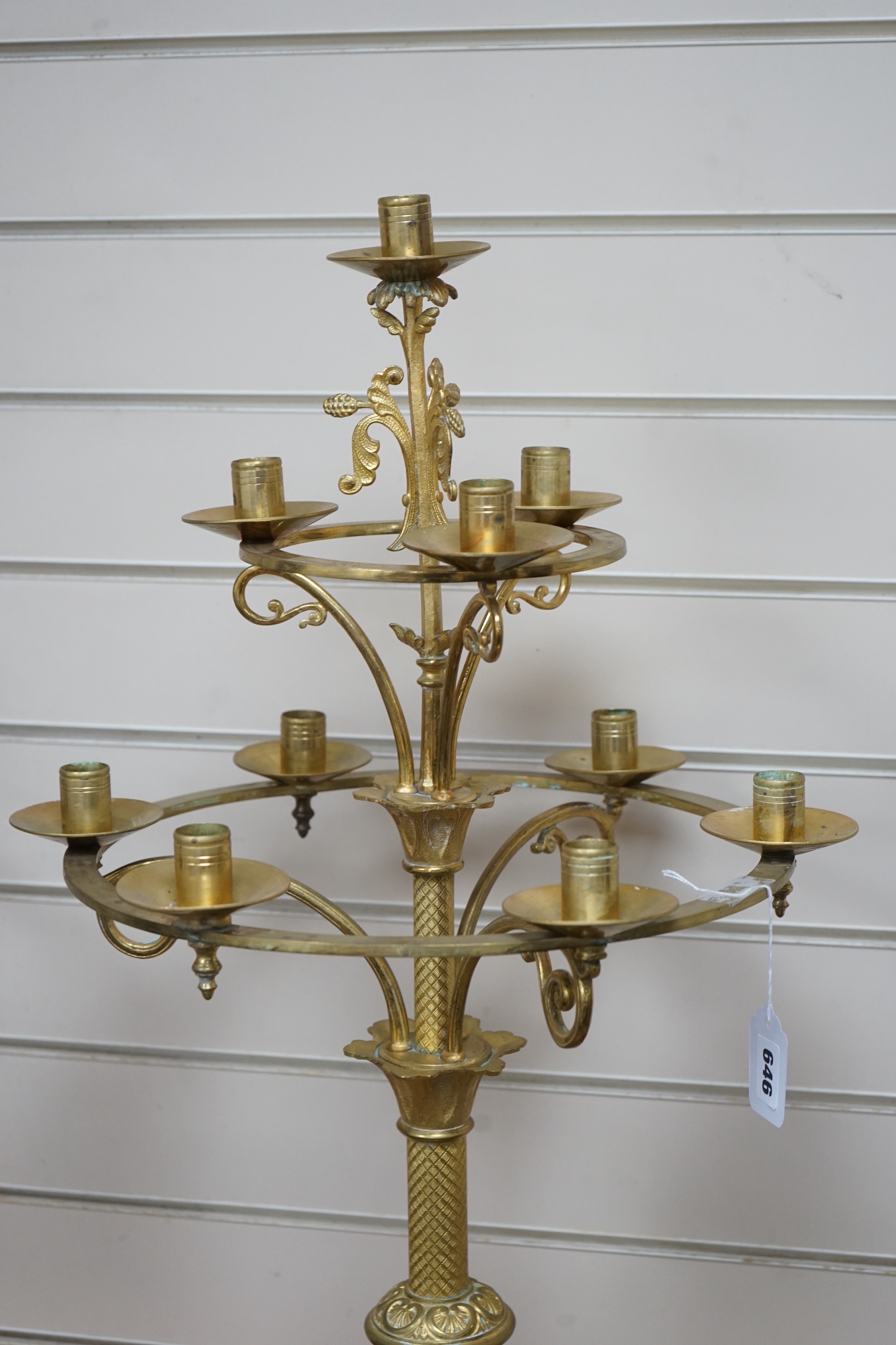 A pair of French neo-gothic ormolu two tier ten light candelabra. 83cm tall